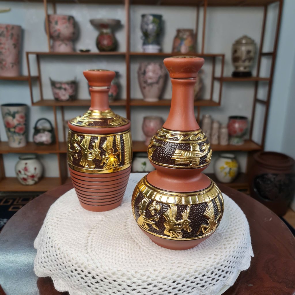 nậm rượu trống đồng dát vàng 24k